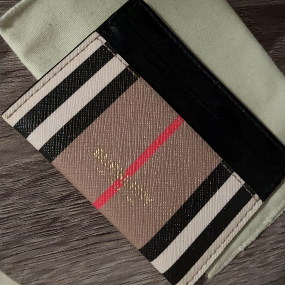 Burberry card holder about 4 months old never really use it . Very cute